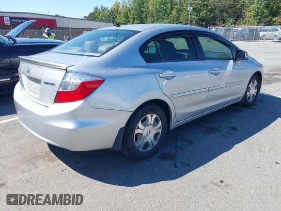 ✅ 2012 Honda Civic • VIN: JHMFB4F30CS007969 • Lot: 43179573. Listed on IAAI with 126,937 mi. Free auction sales archive from the USA and detailed vehicle history report at DreamBid. Image 4.