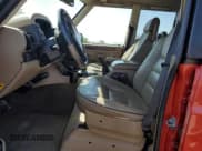 ✅ 2000 Land Rover Discovery Cloth • VIN: SALTY1543YA240519 • Lot: 61064814. Wystawiony na Copart z przebiegiem 246 287 mil. Bezpłatny archiwum sprzedaży aukcyjnych z USA i szczegółowy raport historii pojazdu na DreamBid. Zdjęcie 7.