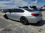 ✅ 2013 BMW 6 Series 650i • VIN: WBAYM9C59DDW20408 • Лот: 73585214. Опубликован ранее на Copart с пробегом 143 605 миль. Бесплатный доступ к архиву аукционных продаж из США и подробный отчёт об истории автомобиля на DreamBid. Изображение 2.