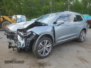 ✅ 2025 Cadillac XT6 AWD Premium Luxury • VIN: 1GYKPDRS8SZ118323 • Lot: 56156145. Listed on Copart with 12,406 mi. Free auction sales archive from the USA and detailed vehicle history report at DreamBid. Image 1.