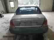 1998 Saturn SL z VIN 1G8ZF5285WZ204569, wystawiony jako Copart lot #43624765 z przebiegiem 318 544 mil mil oraz Szkoda całkowita • Salvage title. Historia ofert i sprzedaży dostępna na DreamBid. Obrazek 6.