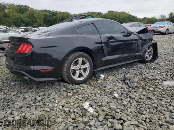 ✅ 2021 Ford Mustang EcoBoost • VIN: 1FA6P8TH7M5153009 • Lot: 81675295. Listed on Copart with 82,442 mi. Free auction sales archive from the USA and detailed vehicle history report at DreamBid. Image 3.