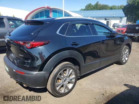 ✅ 2020 Mazda CX-30 Premium • VIN: 3MVDMBEM7LM136882 • Lot: 71989135. Listed on Copart with 68,399 mi. Free auction sales archive from the USA and detailed vehicle history report at DreamBid. Image 3.