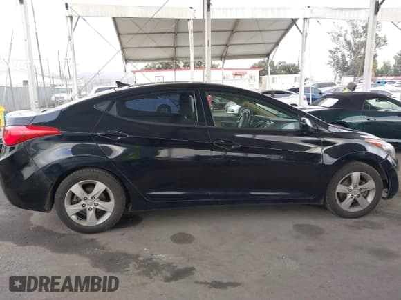 ✅ 2013 Hyundai Elantra GLS • VIN: KMHDH4AE6DU904876 • Lot: 41085148. Listed on IAAI with 179,826 mi. Free auction sales archive from the USA and detailed vehicle history report at DreamBid. Image 13.
