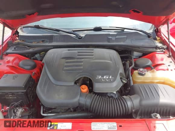 2014 Dodge Challenger SXT 100th Anniversary with VIN 2C3CDYAG0EH285477, listed as a IAAI auction lot 42298675 with 128,684 mi miles and . Bid and sale history available at DreamBid. Image 10.