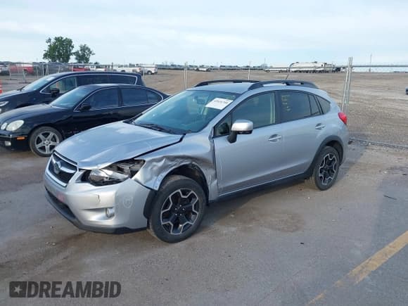 ✅ 2014 Subaru Crosstrek Premium • VIN: JF2GPACC3E9285819 • Lot: 42626768. Listed on IAAI with 152,311 mi. Free auction sales archive from the USA and detailed vehicle history report at DreamBid. Image 2.