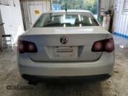 ✅ 2009 Volkswagen Jetta S • VIN: 3VWJZ71K99M010312 • Лот: 84917885. Опубликован ранее на Copart с пробегом 142 057 миль. Бесплатный доступ к архиву аукционных продаж из США и подробный отчёт об истории автомобиля на DreamBid. Изображение 6.