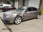 ✅ 2010 Chevrolet Malibu 1LS • VIN: 1G1ZB5EB4AF203697 • Lot: 73420834. Listed on Copart with 103,662 mi. Free auction sales archive from the USA and detailed vehicle history report at DreamBid. Image 1.