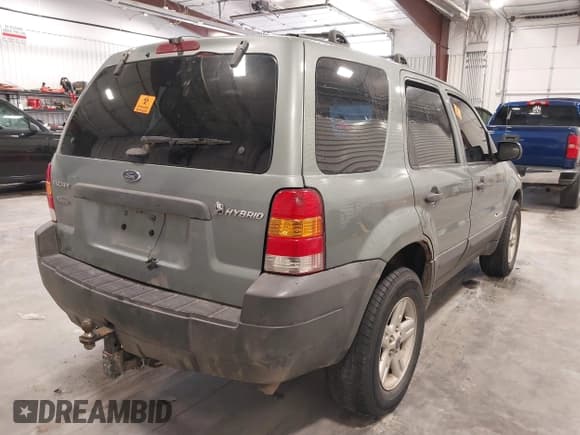 ✅ 2006 Ford Escape Hybrid • VIN: 1FMCU96H16KC87568 • Lot: 42422165. Listed on IAAI with 235,203 mi. Free auction sales archive from the USA and detailed vehicle history report at DreamBid. Image 4.