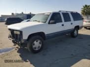 ✅ 1997 Chevrolet Suburban • VIN: 1GNFK16R1VJ339214 • Lot: 85410875. Wystawiony na Copart z przebiegiem 158 297 mil. Bezpłatny archiwum sprzedaży aukcyjnych z USA i szczegółowy raport historii pojazdu na DreamBid. Zdjęcie 1.