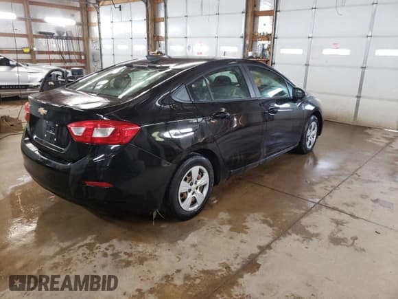 ✅ 2016 Chevrolet Cruze LS • VIN: 1G1BC5SMXG7246366 • Lot: 36322553. Listed on Copart with 92,427 mi. Free auction sales archive from the USA and detailed vehicle history report at DreamBid. Image 3.