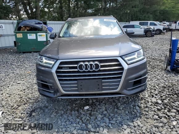 ✅ 2019 Audi Q7 Premium • VIN: WA1AAAF74KD009866 • Lot: 63897575. Wystawiony na Copart z przebiegiem 118 679 mil. Bezpłatny archiwum sprzedaży aukcyjnych z USA i szczegółowy raport historii pojazdu na DreamBid. Zdjęcie 5.