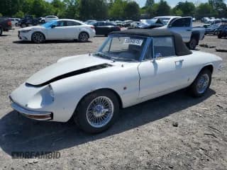 ✅ 1966 Alfa Romeo Spider • VIN: AR660868 • Lot: 55660615. Listed on Copart with 98,902 mi. Free auction sales archive from the USA and detailed vehicle history report at DreamBid. Image 1.