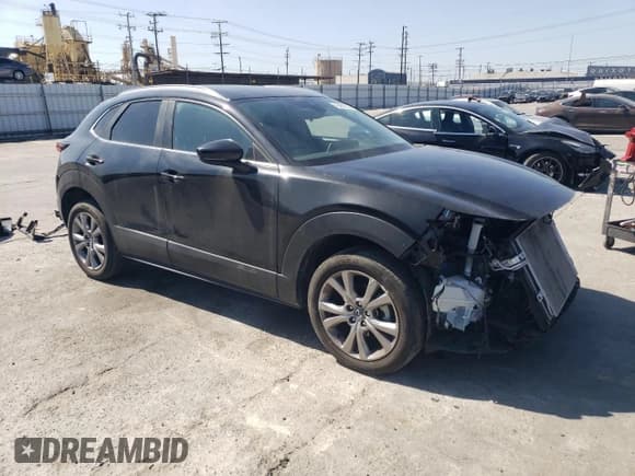 ✅ 2023 Mazda CX-30 S Preferred • VIN: 3MVDMBCMXPM550988 • Lot: 48462525. Listed on Copart with 20,317 mi. Free auction sales archive from the USA and detailed vehicle history report at DreamBid. Image 4.