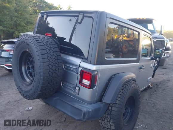 ✅ 2020 Jeep Wrangler Sport S • VIN: 1C4GJXAG1LW273787 • Лот: 43233175. Опубликован ранее на IAAI с пробегом 94 454 миль. Бесплатный доступ к архиву аукционных продаж из США и подробный отчёт об истории автомобиля на DreamBid. Изображение 4.