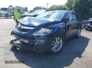 ✅ 2012 Mazda CX-9 Grand Touring • VIN: JM3TB2DA2C0337528 • Lot: 42573752. Listed on IAAI with 208,506 mi. Free auction sales archive from the USA and detailed vehicle history report at DreamBid. Image 2.