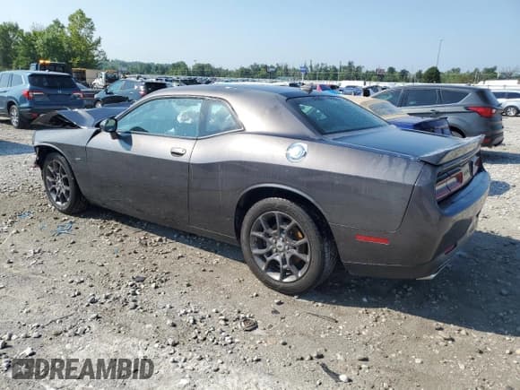 ✅ 2018 Dodge Challenger GT • VIN: 2C3CDZGG0JH256827 • Lot: 65464584. Wystawiony na Copart z przebiegiem 108 677 mil. Bezpłatny archiwum sprzedaży aukcyjnych z USA i szczegółowy raport historii pojazdu na DreamBid. Zdjęcie 2.