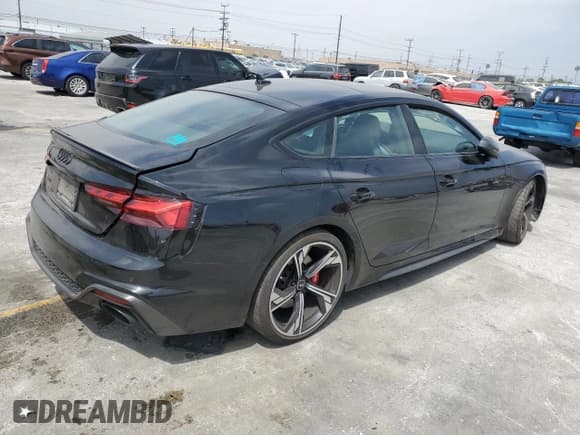 ✅ 2021 Audi RS 5 Sportback • VIN: WUAAWCF53MA904838 • Лот: 56450664. Опубликован ранее на Copart с пробегом 46 020 миль. Бесплатный доступ к архиву аукционных продаж из США и подробный отчёт об истории автомобиля на DreamBid. Изображение 3.