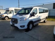 ✅ 2020 Ford Transit Passenger XL • VIN: 1FBAX2Y86LKA24158 • Lot: 84503734. Listed on Copart with 142,051 mi. Free auction sales archive from the USA and detailed vehicle history report at DreamBid. Image 1.