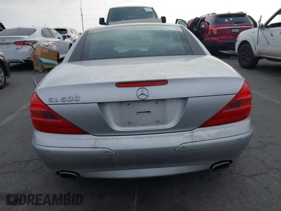 ✅ 2005 Mercedes-Benz SL 500 • VIN: WDBSK75FX5F089216 • Лот: 43628851. Опубликован ранее на IAAI с пробегом 131 800 миль. Бесплатный доступ к архиву аукционных продаж из США и подробный отчёт об истории автомобиля на DreamBid. Изображение 16.
