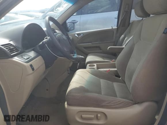 ✅ 2009 Honda Odyssey EX • VIN: 5FNRL38459B413053 • Лот: 82488595. Опубликован ранее на Copart с пробегом 192 917 миль. Бесплатный доступ к архиву аукционных продаж из США и подробный отчёт об истории автомобиля на DreamBid. Изображение 7.