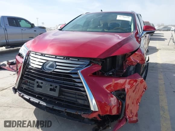✅ 2018 Lexus RX 350L Premium • VIN: JTJGZKCA9J2003227 • Лот: 41793170. Опубликован ранее на IAAI с пробегом 97 907 миль. Бесплатный доступ к архиву аукционных продаж из США и подробный отчёт об истории автомобиля на DreamBid. Изображение 17.