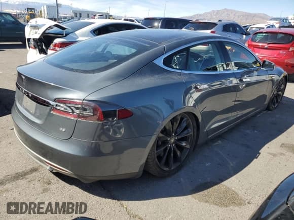 ✅ 2012 Tesla Model S • VIN: 5YJSA1CN2CFP01342 • Лот: 47265875. Опубликован ранее на Copart с пробегом Не указан. Бесплатный доступ к архиву аукционных продаж из США и подробный отчёт об истории автомобиля на DreamBid. Изображение 3.