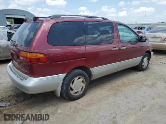 ✅ 1999 Toyota Sienna LE • VIN: 4T3ZF13C1XU158080 • Lot: 65145525. Listed on Copart with 181,543 mi. Free auction sales archive from the USA and detailed vehicle history report at DreamBid. Image 3.