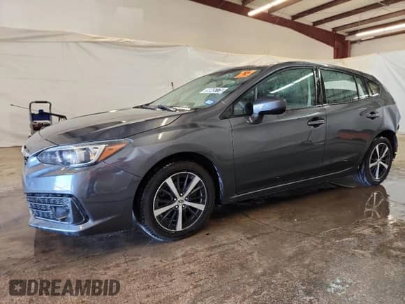 2023 Subaru Impreza Premium z VIN 4S3GTAV64P3704039, wystawiony jako Copart lot #89845775 z przebiegiem 96 207 mil mil oraz Czysty tytuł • Clean title. Historia ofert i sprzedaży dostępna na DreamBid. Obrazek 1.