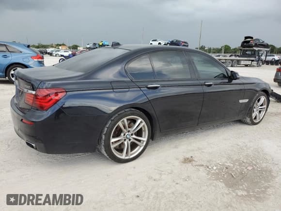 ✅ 2013 BMW 7 Series 750i • VIN: WBAYA8C56DC996704 • Лот: 64466705. Опубликован ранее на Copart с пробегом 102 278 миль. Бесплатный доступ к архиву аукционных продаж из США и подробный отчёт об истории автомобиля на DreamBid. Изображение 3.