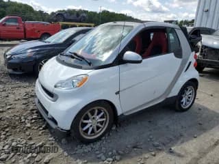 ✅ 2009 Smart fortwo Passion • VIN: WMEEK31X69K212370 • Лот: 67723684. Опубликован ранее на Copart с пробегом 68 232 миль. Бесплатный доступ к архиву аукционных продаж из США и подробный отчёт об истории автомобиля на DreamBid. Изображение 1.