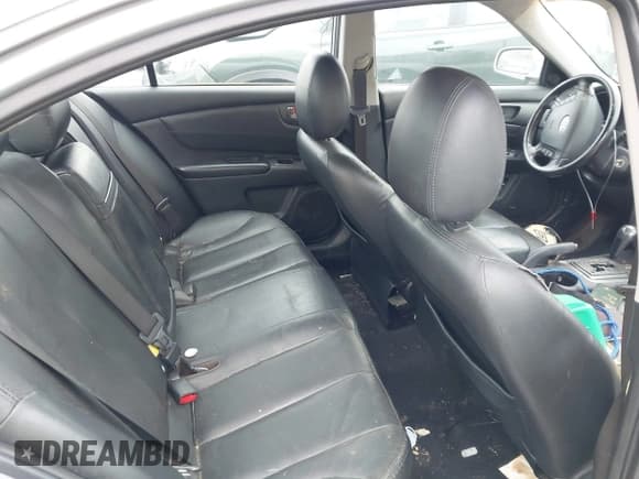 ✅ 2006 Kia Optima LX • VIN: KNAGE123465051197 • Lot: 42787445. Listed on IAAI with 216,912 mi. Free auction sales archive from the USA and detailed vehicle history report at DreamBid. Image 8.