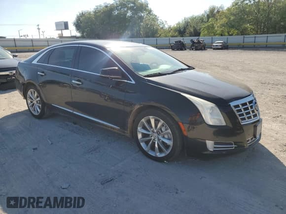 ✅ 2014 Cadillac XTS Luxury • VIN: 2G61N5S33E9271239 • Lot: 86324655. Wystawiony na Copart z przebiegiem 143 493 mil. Bezpłatny archiwum sprzedaży aukcyjnych z USA i szczegółowy raport historii pojazdu na DreamBid. Zdjęcie 4.