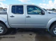 ✅ 2005 Nissan Frontier LE • VIN: 1N6AD07U05C463681 • Lot: 43757506. Listed on IAAI with 184,377 mi. Free auction sales archive from the USA and detailed vehicle history report at DreamBid. Image 14.