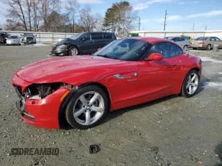 ✅ 2014 BMW Z4 sDrive28i • VIN: WBALL5C57EP556519 • Lot: 88090055. Listed on Copart with 124,767 mi. Free auction sales archive from the USA and detailed vehicle history report at DreamBid. Image 1.