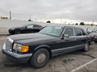 ✅ 1990 Mercedes-Benz 560 • VIN: WDBCA39E7LA504486 • Lot: 62374765. Listed on Copart with 112,165 mi. Free auction sales archive from the USA and detailed vehicle history report at DreamBid. Image 1.