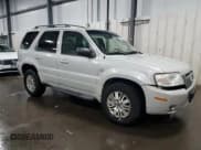 ✅ 2007 Mercury Mariner Premier • VIN: 4M2CU97127KJ20010 • Lot: 52123205. Wystawiony na Copart z przebiegiem 162 337 mil. Bezpłatny archiwum sprzedaży aukcyjnych z USA i szczegółowy raport historii pojazdu na DreamBid. Zdjęcie 4.