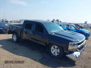 2018 Chevrolet Silverado 1500 LT z VIN 3GCUKREC4JG169096, wystawiony jako IAAI lot #43001271 z przebiegiem 163 039 mil mil oraz . Historia ofert i sprzedaży dostępna na DreamBid. Obrazek 1.