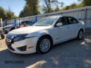 ✅ 2012 Ford Fusion Hybrid • VIN: 3FADP0L32CR254953 • Lot: 90509665. Wystawiony na Copart z przebiegiem 136 606 mil. Bezpłatny archiwum sprzedaży aukcyjnych z USA i szczegółowy raport historii pojazdu na DreamBid. Zdjęcie 1.