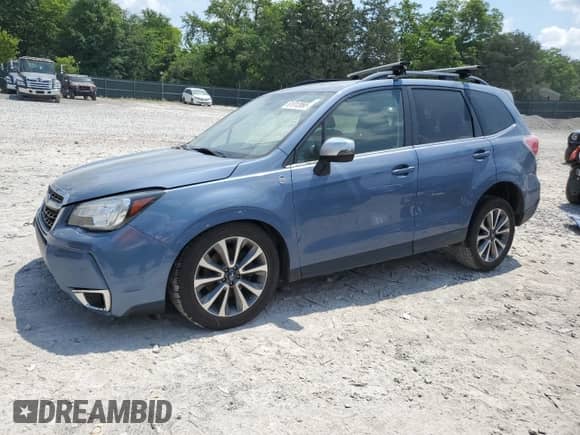 2018 Subaru Forester Touring with VIN JF2SJGWC4JH535224, listed as a Copart auction lot 61912065 with 100,930 mi miles and Salvage title. Bid and sale history available at DreamBid. Image 1.