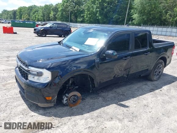 ✅ 2023 Ford Maverick XL • VIN: 3FTTW8F9XPRB02755 • Lot: 42313102. Listed on IAAI with 16,111 mi. Free auction sales archive from the USA and detailed vehicle history report at DreamBid. Image 2.