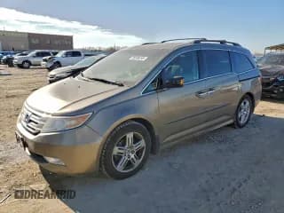 ✅ 2012 Honda Odyssey Touring • VIN: 5FNRL5H95CB035430 • Lot: 95500255. Listed on Copart with 188,215 mi. Free auction sales archive from the USA and detailed vehicle history report at DreamBid. Image 1.