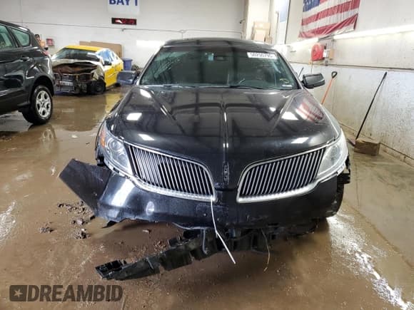 ✅ 2015 Lincoln MKS • VIN: 1LNHL9DK6FG601516 • Lot: 50250795. Listed on Copart with 71,103 mi. Free auction sales archive from the USA and detailed vehicle history report at DreamBid. Image 5.