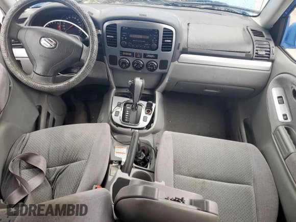 ✅ 2005 Suzuki Grand Vitara LX • VIN: JS3TD62V354200952 • Lot: 60374465. Wystawiony na Copart z przebiegiem 134 957 mil. Bezpłatny archiwum sprzedaży aukcyjnych z USA i szczegółowy raport historii pojazdu na DreamBid. Zdjęcie 8.