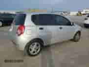 2009 Chevrolet Aveo 1LT z VIN KL1TD66E59B672121, wystawiony jako Copart lot #82662134 z przebiegiem 111 612 mil mil oraz Czysty tytuł • Clean title. Historia ofert i sprzedaży dostępna na DreamBid. Obrazek 3.