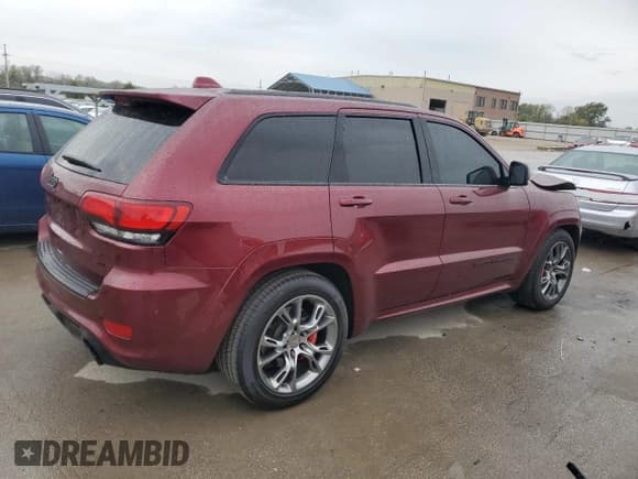 ✅ 2021 Jeep Grand Cherokee SRT • VIN: 1C4RJFDJXMC715639 • Lot: 87008415. Listed on Copart with 102,099 mi. Free auction sales archive from the USA and detailed vehicle history report at DreamBid. Image 3.