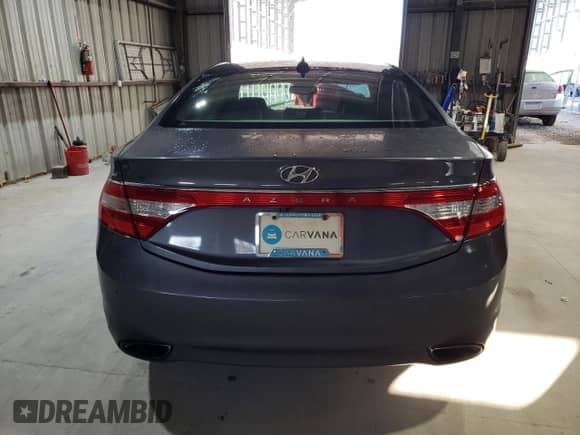 2012 Hyundai Azera с VIN KMHFH4JG9CA149457, выставлен на аукционе Copart как лот 80134214 с пробегом 93 012 миль миль и Списание • Salvage title. История ставок и продаж доступна на DreamBid. Изображение 6.