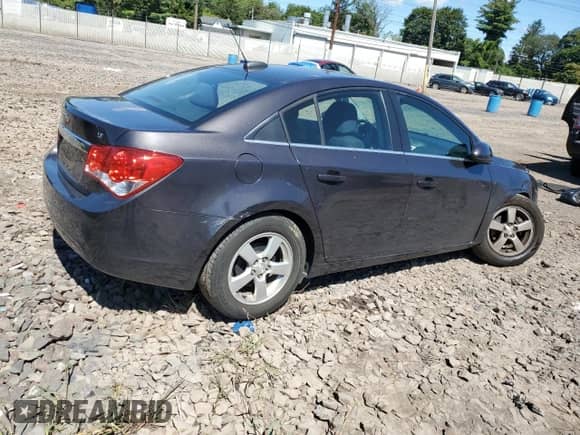 2016 Chevrolet Cruze LT with VIN 1G1PE5SB0G7133475, listed as a Copart auction lot 69510875 with 105,653 mi miles and Salvage title. Bid and sale history available at DreamBid. Image 3.