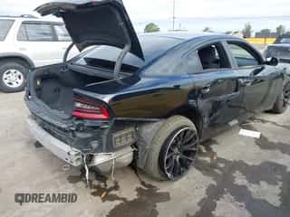 2016 Dodge Charger SE with VIN 2C3CDXBG7GH347954, listed as a IAAI auction lot 42805144 with Not provided miles and . Bid and sale history available at DreamBid. Image 4.