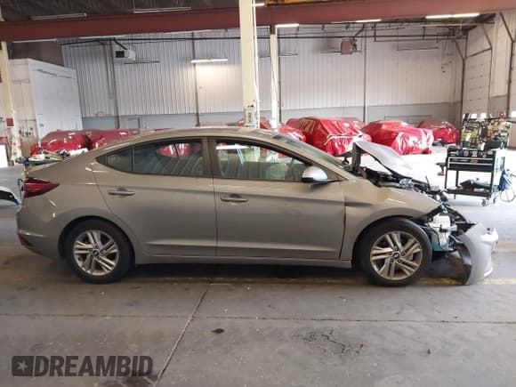 ✅ 2020 Hyundai Elantra SEL • VIN: KMHD84LFXLU099324 • Lot: 43377345. Listed on IAAI with 61,600 mi. Free auction sales archive from the USA and detailed vehicle history report at DreamBid. Image 13.